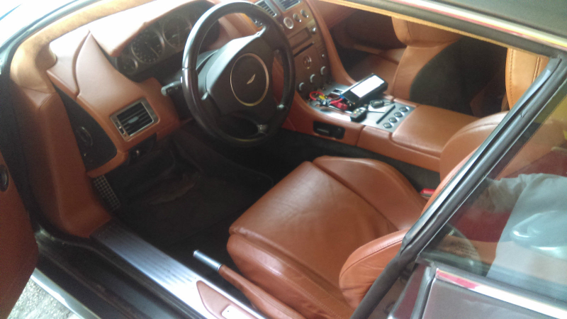 Illustration for article titled Someone Please Save This Stupid Cheap Aston Martin DB9 Before I Do